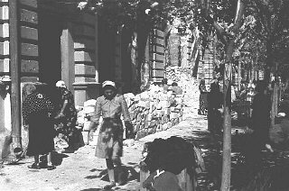 Jewish women at forced labor in the process of clearing...