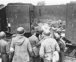 US soldiers discovered these boxcars loaded with dead...