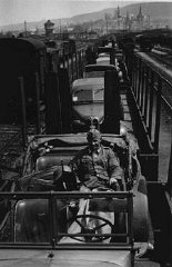 German vehicles loaded on trains headed toward the...