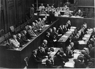 The Krupp Trial defendants in the dock (left) and their...
