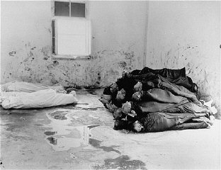 Corpses are piled in the crematorium mortuary in the...