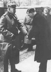 Adolf Hitler, the newly appointed chancellor, greets...