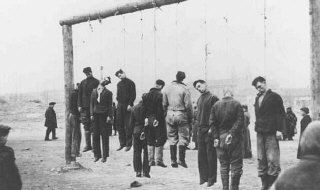 Polish partisans are hanged by the Nazis.