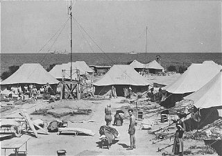 One of the tent camps used to detain Jewish displaced...