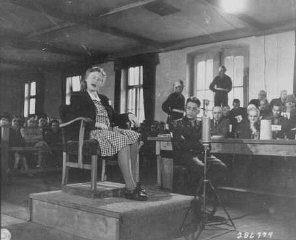 Ilse Koch testifies in her own defense at the trial...