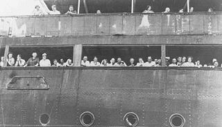 Refugees aboard the "St. Louis" wait to hear...