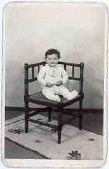 Portrait of Tsewie Herschel seated in a chair, taken...