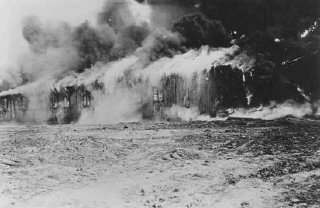 The Bergen-Belsen former concentration camp is burned...