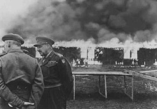 The Bergen-Belsen former concentration camp is burned...