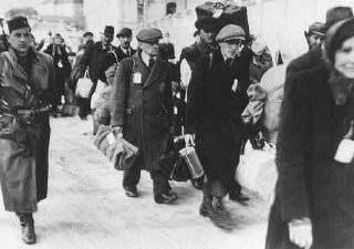 Deportation of Slovak Jews. The victims wear tags and...