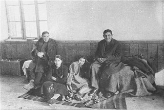 At the Tobacco Monopoly transit camp in Skopje, a family...