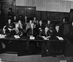 The I. G. Farben defendants hear the indictments against...