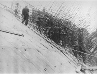 Prisoners at forced labor constructing the new Dachau...