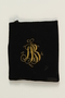 Black velvet embroidered tefillin bag buried for safekeeping while owner in hiding