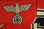 Reich service flag with a swastika and Nazi eagle captured by an uknown soldier