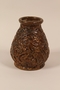 Handthrown ceramic vase with relief design of birds used by a German Jewish refugee family