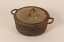 Cast iron dutch oven pot and lid from cafe used as rendezvous point by French resistance