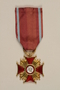 Gold Krzyz Zaslugi [Cross of Merit] with ribbon, certificate, and box awarded to a Polish midwife for postwar service