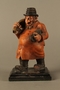 Painted wooden figurine of a Jewish schnorrer