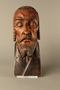 Wooden carving of the head of a Jewish man