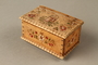 Wooden box with carved and painted floral decorations