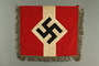 Metallic fringed Nazi flag given to US internee camp commander by German prisoner