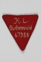Red triangle prisoner badge 67988 from Buchenwald