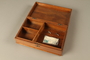 Wooden box, insert, two keys, and postcard wrapped in metal
