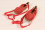 Pair of women's red espadrilles owned by a participant of the Emergency Rescue Committee