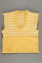 Child's striped yellow vest knit by Cila Knaster and worn by Mirka Knaster