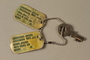 Set of US Army issue dog tags and a key on a chain belonging to a German Jewish refugee and soldier