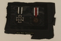 WWI Hindenburg Cross medal with attached red, white, and black ribbon