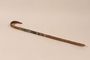 Metal covered cane used by a member of the German army